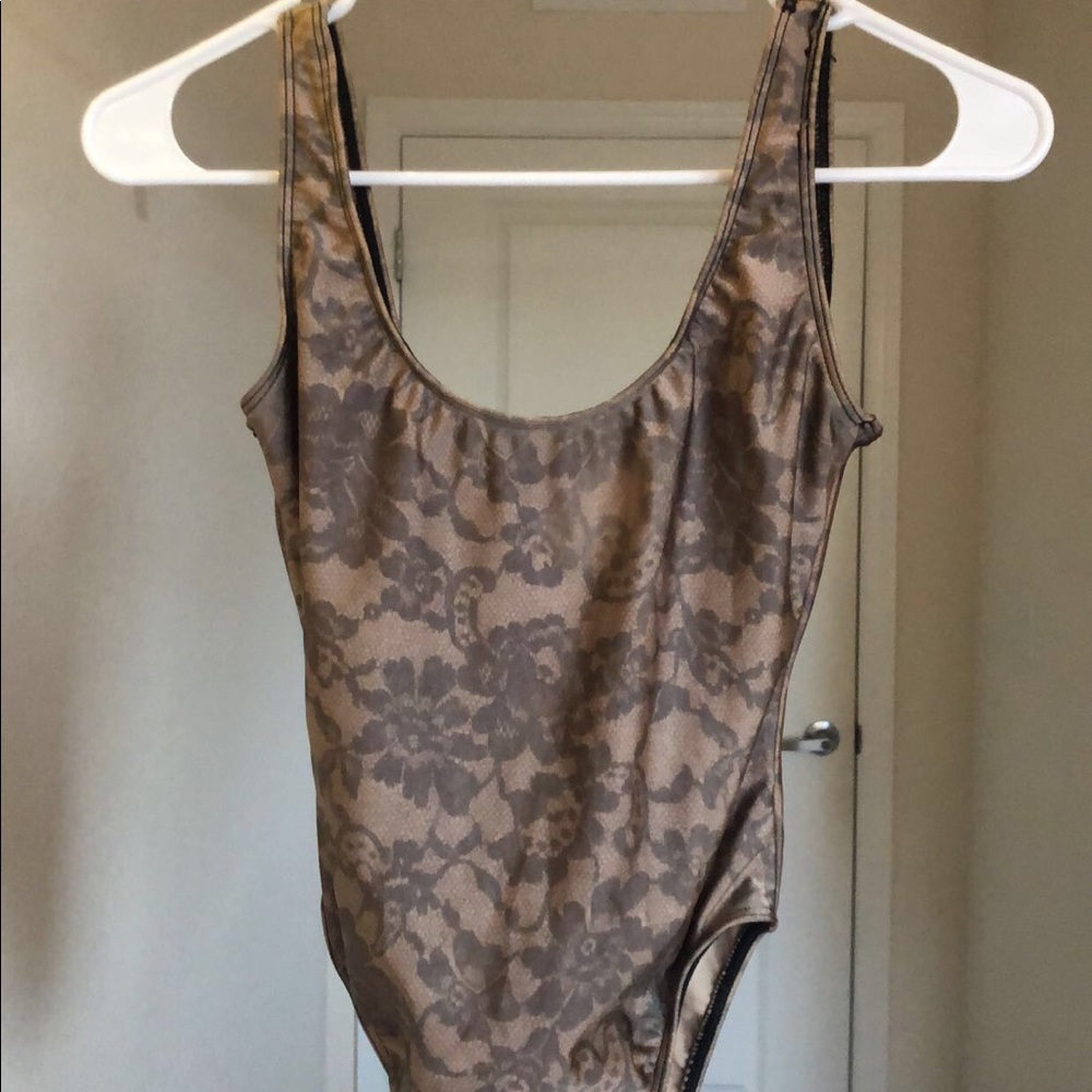 tan body suit